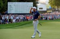 Jun 19, 2016; Oakmont, PA, USA; Dustin Johnson removes his cap after winning the U.S. Open golf tournament at Oakmont Country Club. Mandatory Credit: Michael Madrid-USA TODAY Sports