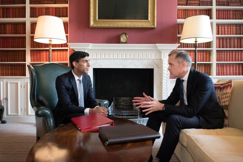 Britain's Chancellor of the Exchequer Rishi Sunak meets with the Governor of the Bank of England Mark Carney at Downing Street, in London