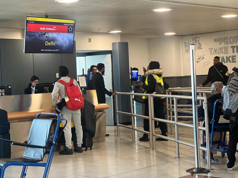 Boarding gate for New Delhi.