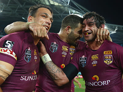 Queensland boys celebrate the one-point win