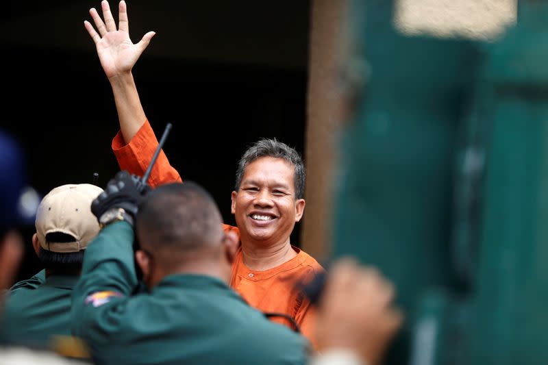 Labor activist Rath Rott Mony arrives to the Phnom Penh Municipal Court for verdict over his role in making a documentary about sex-trafficking that the government said contained fake news, in Phnom Penh