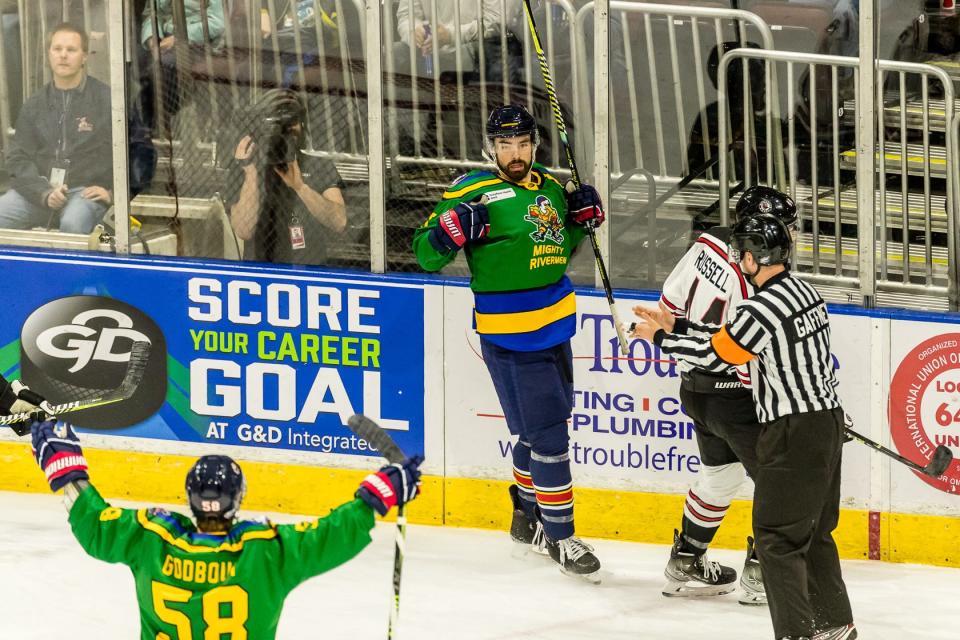 Rivermen winger Mitch McPherson celebrates the first goal of his hat trick in a 5-3 win over Huntsville at Carver Arena on Saturday, Dec. 10, 2022.