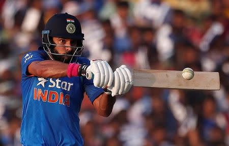 Cricket - India v England - Second One Day International - Barabati Stadium, Cuttack, India - 19/01/17. India's Yuvraj Singh plays a shot. REUTERS/Adnan Abidi