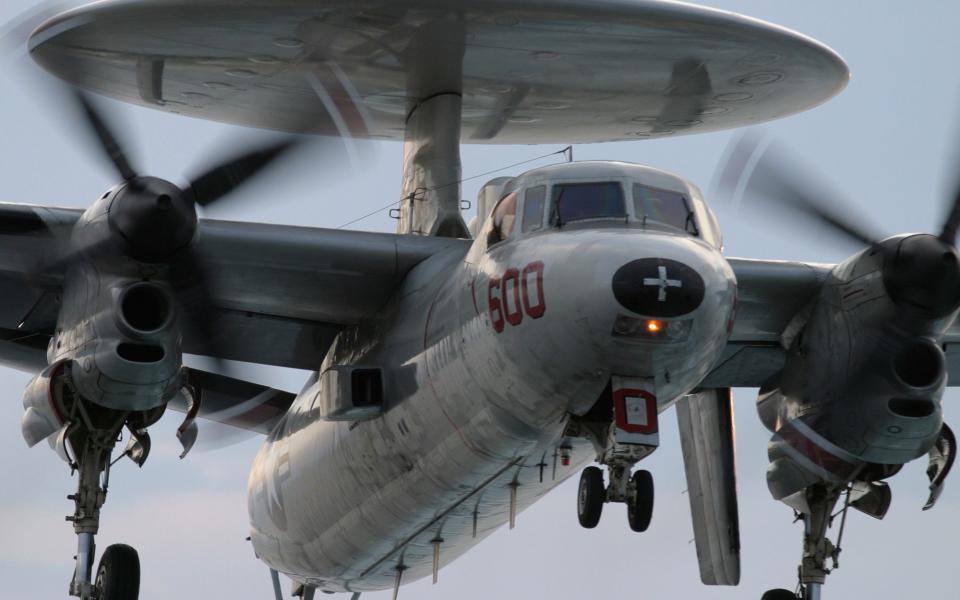 An E-2 Hawkeye radar aircraft comes in to land on a US carrier. The ability to monitor hundreds of miles of airspace is critical