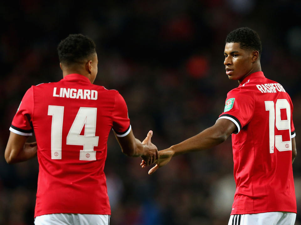 Marcus Rashford celebrates his first goal with Jesse Lingard: Getty