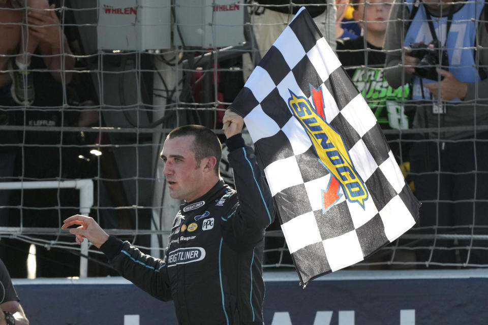 Austin Cindric celebrates after winning a NASCAR Cup Series auto race at World Wide Technology Raceway Sunday, June 2, 2024, in Madison, Ill. (AP Photo/Jeff Roberson)