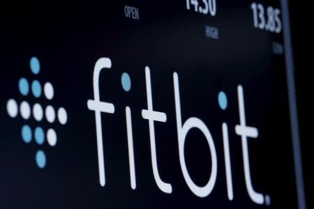 The ticker symbol for Fitbit is displayed at the post where it is traded on the floor of the New York Stock Exchange (NYSE) February 23, 2016. REUTERS/Brendan McDermid