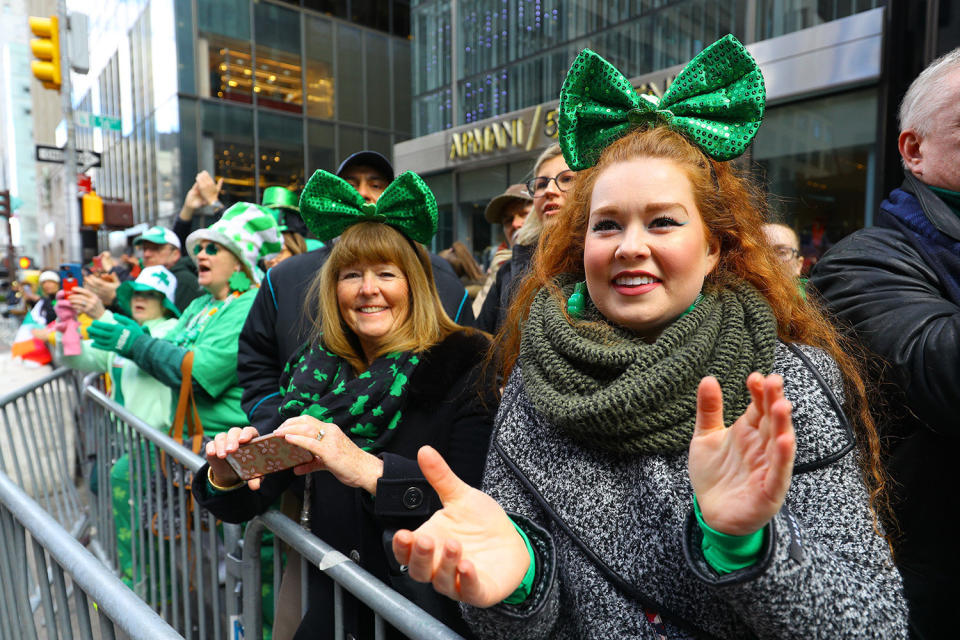 Crowds along Fifth Ave. are dressed fashionably green in clothing for the St. Patrick's Day Parade on March 16, 2019 in New York. (Photo: Gordon Donovan/Yahoo News)