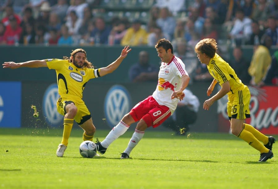 CARSON, CA – NOVEMBER 23: Frankie Hejduk #2 and Brian Carroll #16 of the Columbus Crew defend Sinsa Ubiparipovic #8 of the New York Red Bulls during the 2008 MLS Cup match at The Home Depot Center on November 23, 2008 in Carson, California. The Crew defeated the Red Bulls 3-1. (Photo by Victor Decolongon/Getty Images)