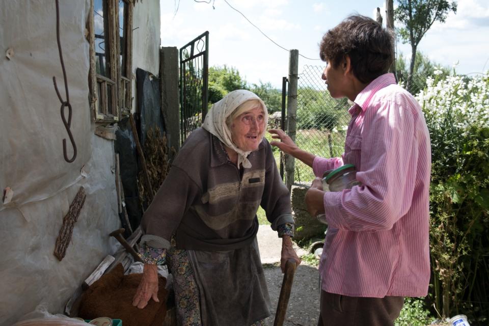 Dimitrina Kolikova delivers food to elderly and invalid residents