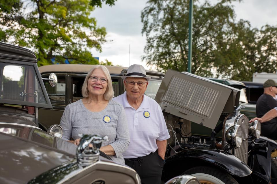 Rainelle and Ralph Carducci pose near their Ford Model A car July 6 at a club meet at the Monroe Center for Healthy Aging.