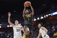 Baylor's NaLyssa Smith (1) makes a basket as Michigan's Emily Kiser (33) and Michigan's Jordan Hobbs (10) defend in the first half of an NCAA college basketball game, Sunday, Dec. 19, 2021, in Uncasville, Conn. (AP Photo/Jessica Hill)