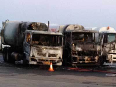 <p>The burnt out council trucks.</p>