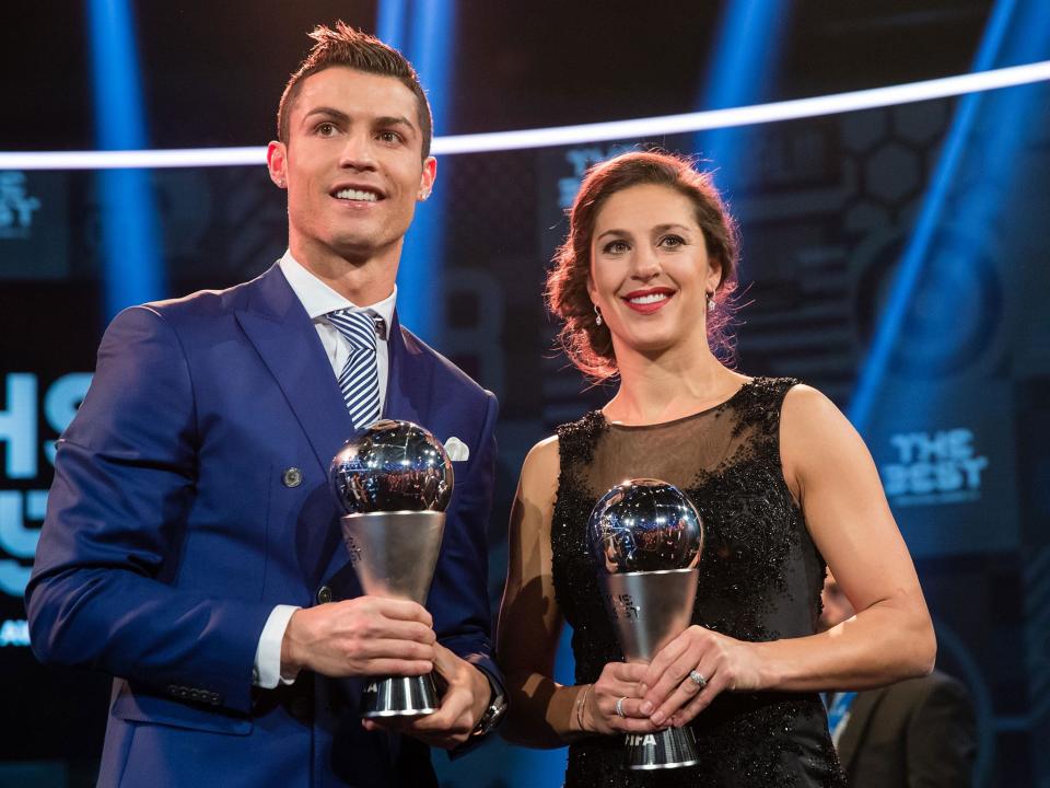 Lloyd with Cristiano Ronaldo at the Best Fifa Football Awards (Getty)