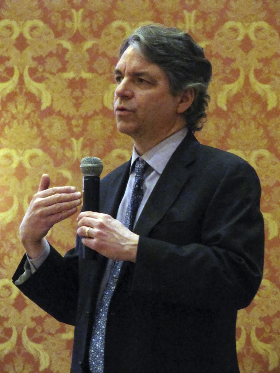 FILE - Joseph Goffman, associate assistant administrator for climate and senior counsel for the Environmental Protection Agency, addresses the Wyoming Infrastructure Authority winter meeting in Cheyenne, Wyo., on Feb. 3, 2015. The Senate approved Goffman, President Joe Biden's nominee, to lead the EPA's air pollution office on Wednesday, Jan. 31, 2024, just as the agency is set to finalize rules over climate-changing emissions from power plants and cars and trucks. (AP Photo/Mead Gruver, File)