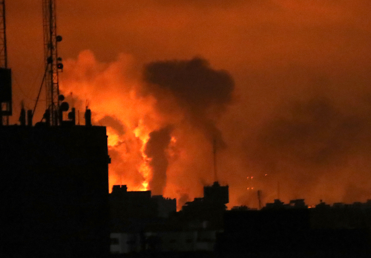 Explosions caused by Israeli airstrikes in northern Gaza on Friday (AP)