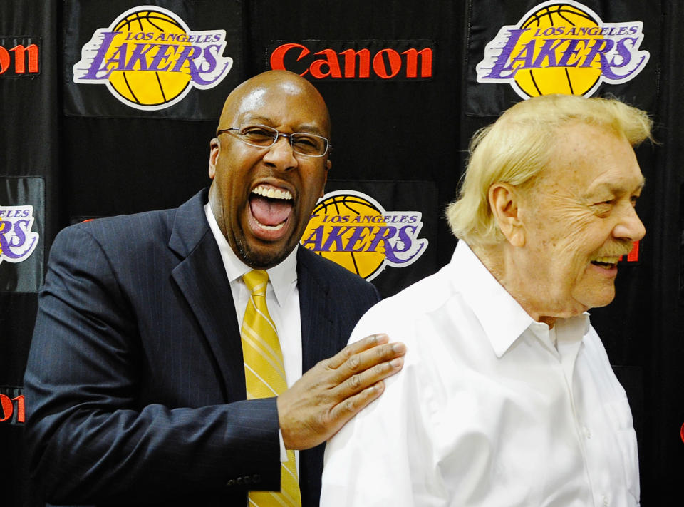 Mike Brown, (L) the new head coach for the Los Angeles Lakers, laughs with team owner Jerry Buss after Brown's introductory news conference at the team's training facility on May 31, 2011 in El Segundo, California. Brown replaces Lakers coach Phil Jackson, who retired at the end of this season. (Photo by Kevork Djansezian/Getty Images)