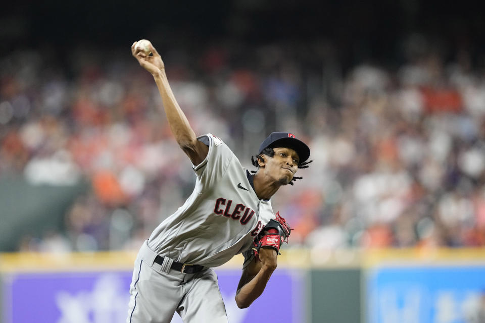 Cleveland Guardians starting pitcher Triston McKenzie throws against the Houston Astros during the first inning of a baseball game Monday, May 23, 2022, in Houston. (AP Photo/David J. Phillip)