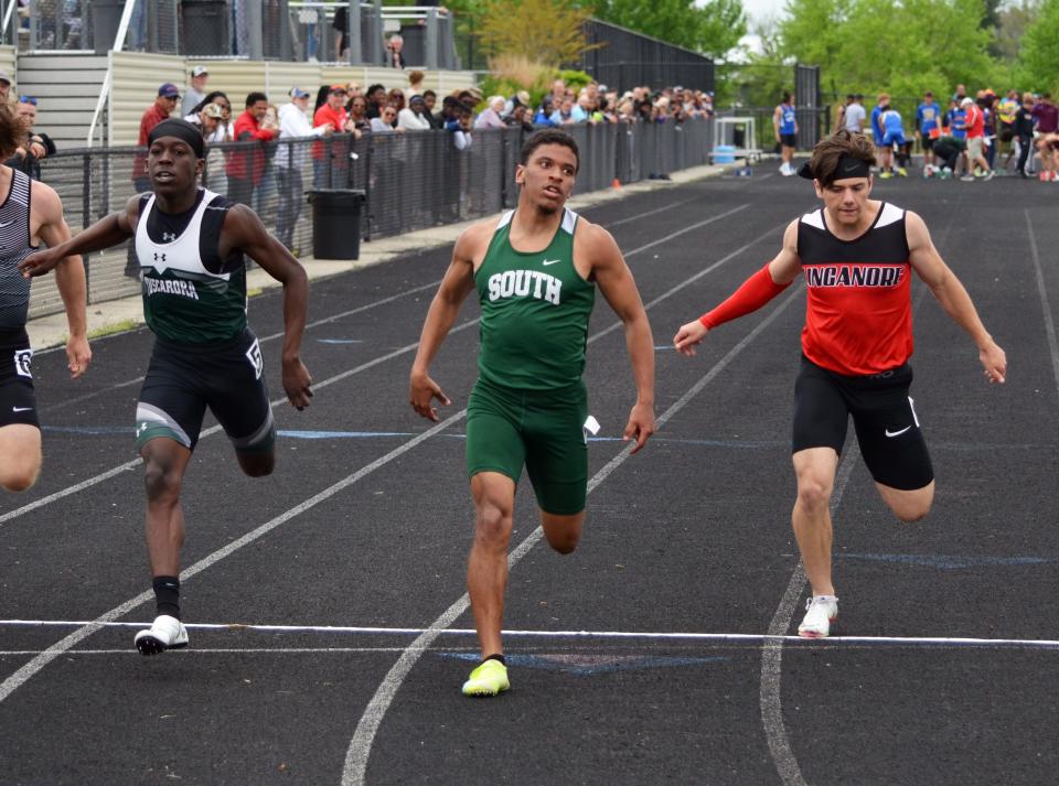 South Hagerstown's Cole Schlotterbeck crosses the finish line in first place in the Spires Division boys 100-meter final at the CMC championships. After winning the 100 in 11.12 seconds, Schlotterbeck captured the Spires title in the 200 in 22.06.