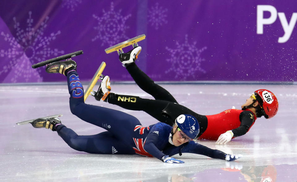 <p>Short-track skater Elise Christie crashes in the 1500metres. After three disqualifications at the Sochi 2014 Games, Christie returned hungry to prove her detractors wrong. Only her ill-fortune continued, with further disqualifications and injury seeing her end her Games on her bottom on the ice (Mike Egerton/PA). </p>