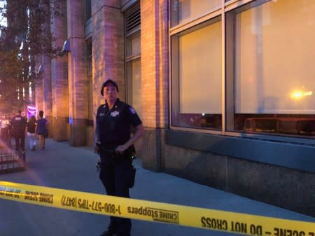 New York police officer seen at a command post during a blackout caused by power outages in the Manhattan borough of New York