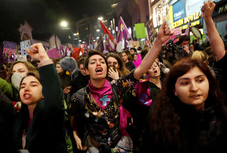 People react as police try to disperse a march marking International Women's Day in Istanbul, Turkey, March 8, 2019. REUTERS/Murad Sezer