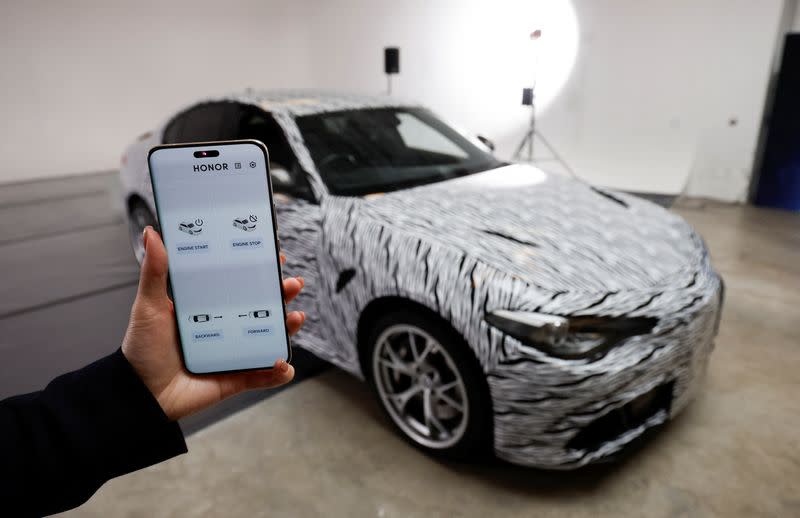 Honor staff drives a car with an eye-control app