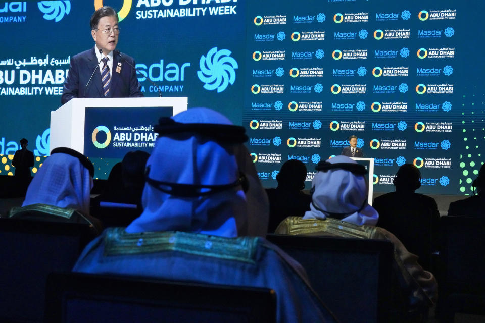 South Korean President Moon Jae-in speaks during Abu Dhabi Sustainability Week at Dubai Expo 2020 in Dubai, United Arab Emirates, Monday, Jan. 17, 2022. The president of South Korea on Monday vowed to world leaders that his fossil fuel-dependent country and the oil-rich United Arab Emirates would jointly expand their investments in renewable energy to tackle climate change. (AP Photo/Jon Gambrell)