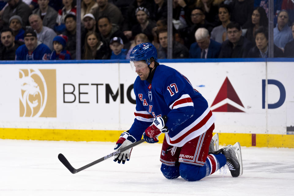 New York Rangers right wing Blake Wheeler (17) collapses to the ice in the first period of an NHL hockey game against the Montreal Canadiens, Thursday, Feb. 15, 2024, in New York. (AP Photo/Peter K. Afriyie)