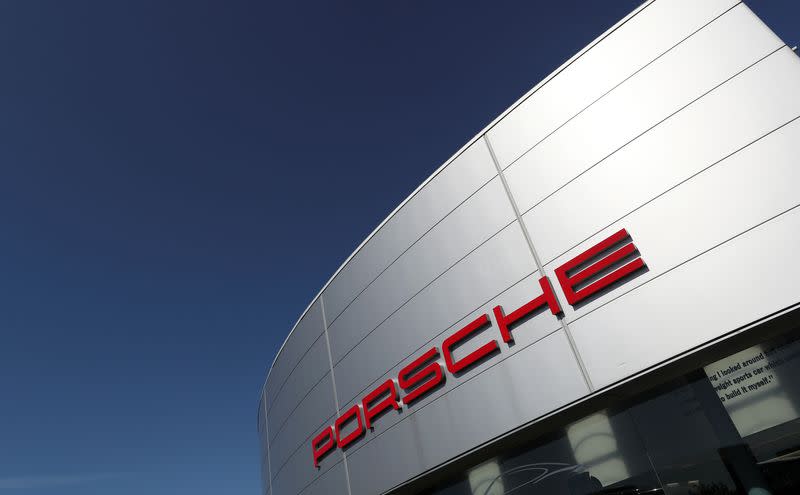 A logo of Porsche is seen outside a Porsche car dealer, amid the coronavirus disease (COVID-19) outbreak in Brussels