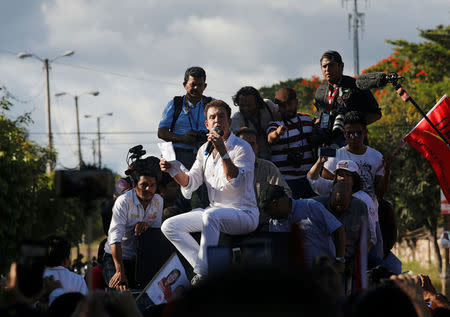 Salvador Nasralla, presidential candidate for the Opposition Alliance Against the Dictatorship gives a speech to supporters as he takes part in a protest while the country is still mired in chaos over a contested presidential election in Tegucigalpa, Honduras December 3, 2017. REUTERS/Henry Romero