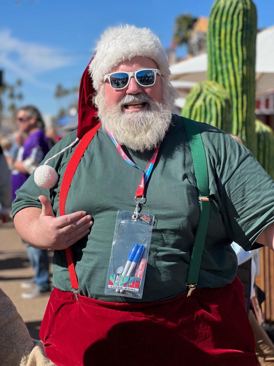 Santa showed up in Old Town Scottsdale at the ESPN tailgate event to root for both teams in Super Bowl 57.
