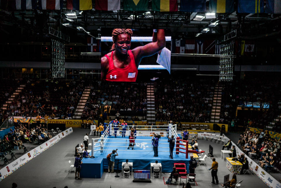 <p>Claressa “T-Rex” Shields on the big screen after winning the Gold Medal at the 2015 Pan Am Games in Toronto, Canada. (Photograph by Zackary Canepari) </p>