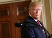 U.S. President Donald Trump looks at Japanese Prime Minister Shinzo Abe during a joint news conference at the White House in Washington, U.S., February 10, 2017. REUTERS/Joshua Roberts