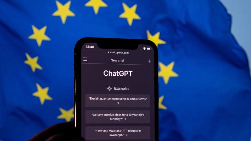 An illustration of ChatGPT on a phone is shown against a European Union flag.