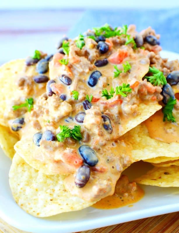 <p>Salty Side Dish</p><p>Pile this on a plate of warm tortilla chips for the best nachos of your life.</p><p><strong>Get the recipe: <a href="https://www.saltysidedish.com/cheeseburger-dip-crock-pot/" rel="nofollow noopener" target="_blank" data-ylk="slk:Crock Pot Cheeseburger Dip;elm:context_link;itc:0;sec:content-canvas" class="link rapid-noclick-resp">Crock Pot Cheeseburger Dip</a></strong></p><p><strong>Recipe: <a href="https://parade.com/987117/cathypollak/best-slow-cooker-dip-recipes/" rel="nofollow noopener" target="_blank" data-ylk="slk:16 Slow Cooker Dips;elm:context_link;itc:0;sec:content-canvas" class="link rapid-noclick-resp">16 Slow Cooker Dips</a></strong></p>