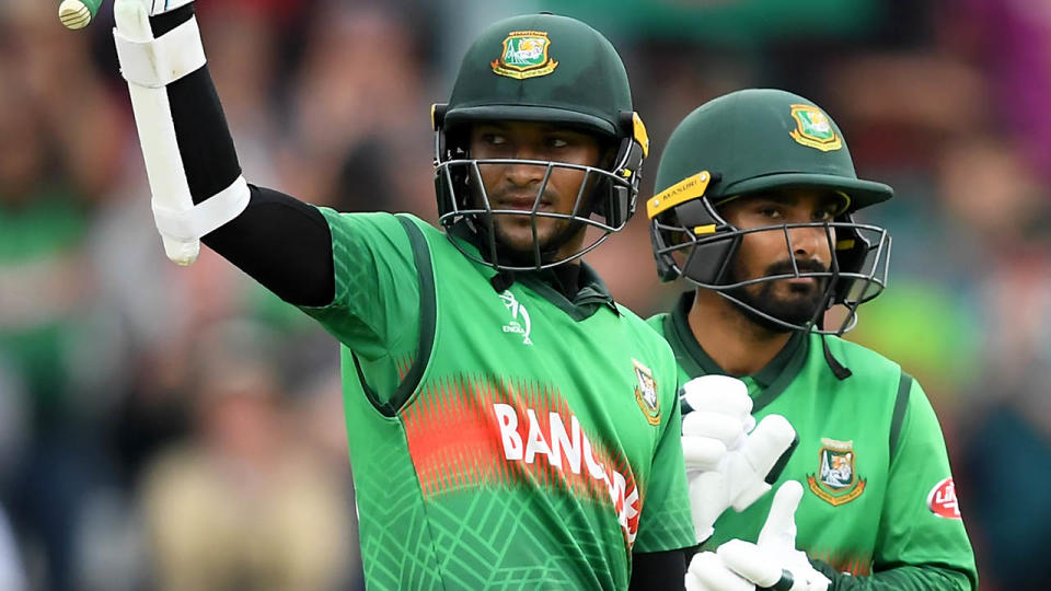 Shakib Al Hasan celebrates his century with Liton Das. (Photo by Alex Davidson/Getty Images)