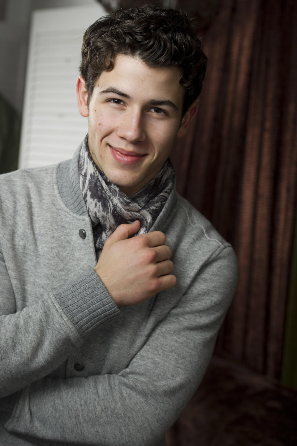 In this Feb. 22, 2012 photo, Nick Jonas poses for a portrait in his dressing room before a performance of Broadway's "How to Succeed in Business Without Really Trying", in New York. (AP Photo/Charles Sykes)