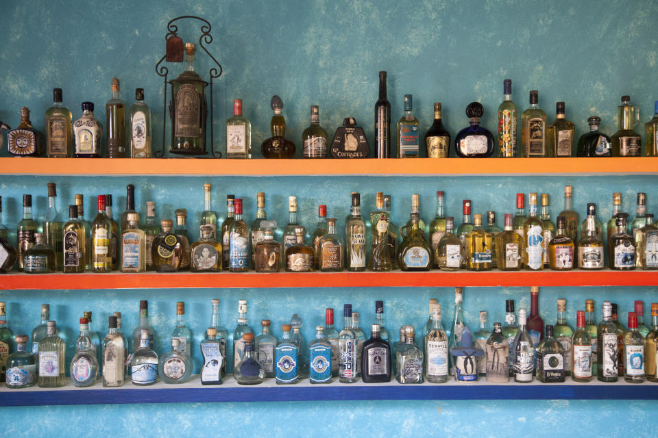 three shelf levels of tequila bottles