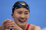 Yui Ohashi, of Japan, celebrates after winning the women's 200-meter individual medley final at the 2020 Summer Olympics, Wednesday, July 28, 2021, in Tokyo, Japan.(AP Photo/Charlie Riedel)