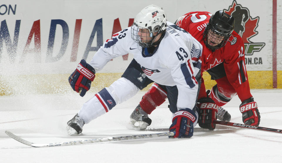 Team USA's Tyler Amburgey (No. 43) collided with Peter Holland of Team Ontario at the 2008 World Under 17 Challenge in Canada. (Photo: Claus Andersen via Getty Images)