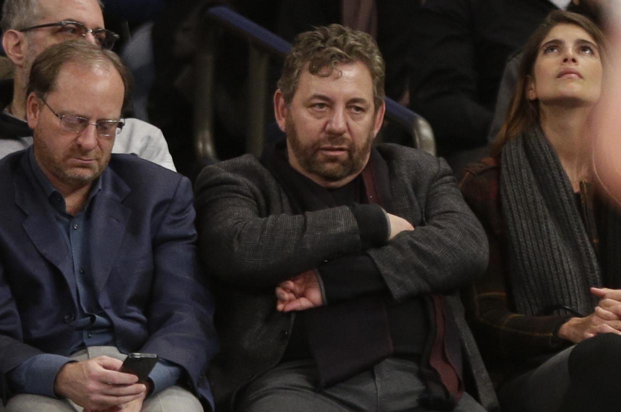 Knicks owner James Dolan (C) watches from the sidelines. (AP)
