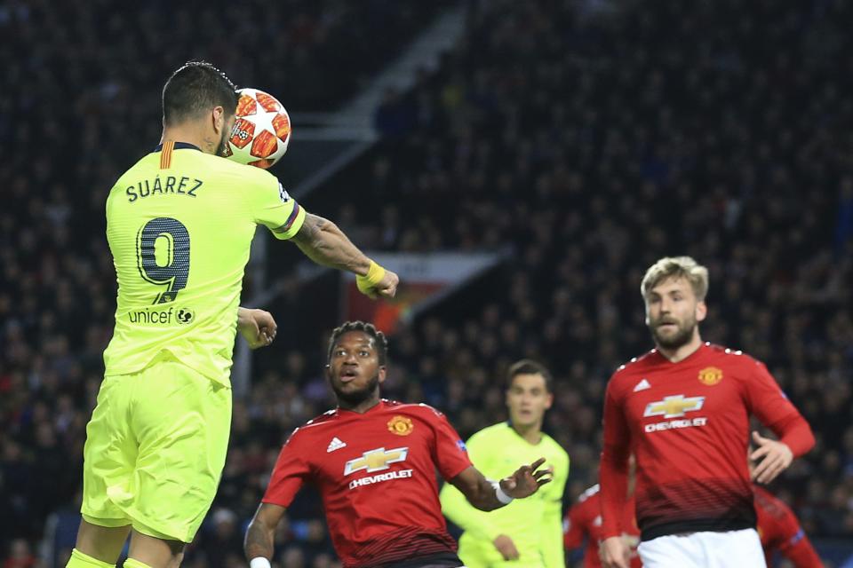 Barcelona's Luis Suarez scores the opening goal of his team during the Champions League quarterfinal, first leg, soccer match between Manchester United and FC Barcelona at Old Trafford stadium in Manchester, England, Wednesday, April 10, 2019. (AP Photo/Jon Super)