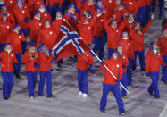 <p>Emil Hegle Svendsen carries the flag of Norway during the opening ceremony of the 2018 Winter Olympics in Pyeongchang, South Korea, Friday, Feb. 9, 2018. (AP Photo/Michael Sohn) </p>