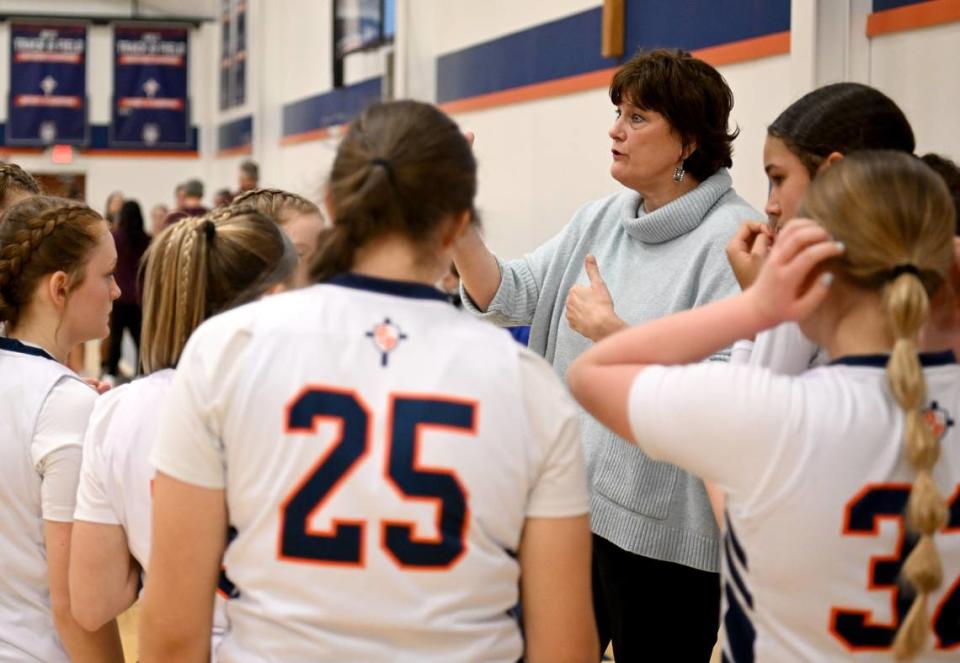 Saint Joseph’s girls basketball coach Bethany Irwin talks to the players before the second half of the against Millersburg on Wednesday, Jan. 17, 2024.