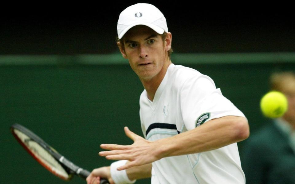 Andy Murray in action against Argentina's David Nalbandian during the third round of the Men's Singles of The Lawn Tennis Championships at Wimbledon on June 25, 2005 - Andrew Parsons/PA