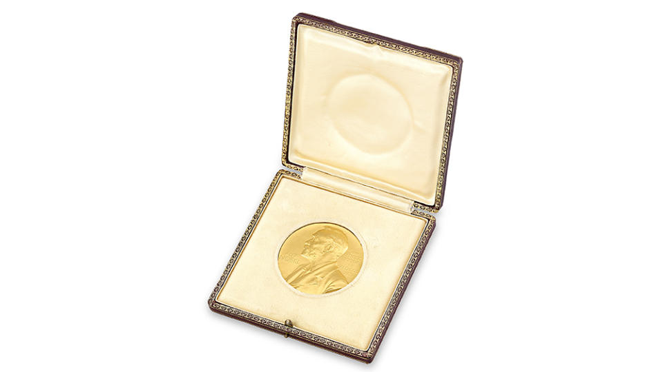 The Nobel Prize medal inside its original protective box that comes with the purchase