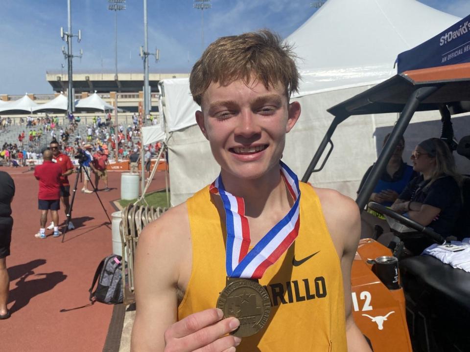 Amarillo High senior distance runner Isaac McGill poses with his Class 5A 3,200 bronze medal.