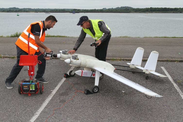 <span class="caption">Trialling a fixed-wing drone for public service use.</span> <span class="attribution"><span class="source">Jason Andrews</span>, <span class="license">Author provided</span></span>