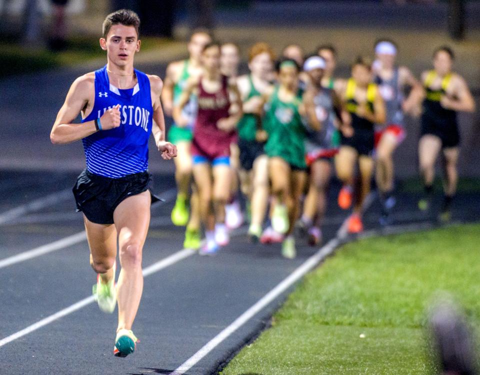 Limestone's Georges Wilson takes a large and immediate lead over his competition on the 1600-meter run during the Class 2A Metamora Sectional track and field meet Wednesday, May 18, 2022 at Metamora High School. Wilson won the event in a time of 4:09.47.